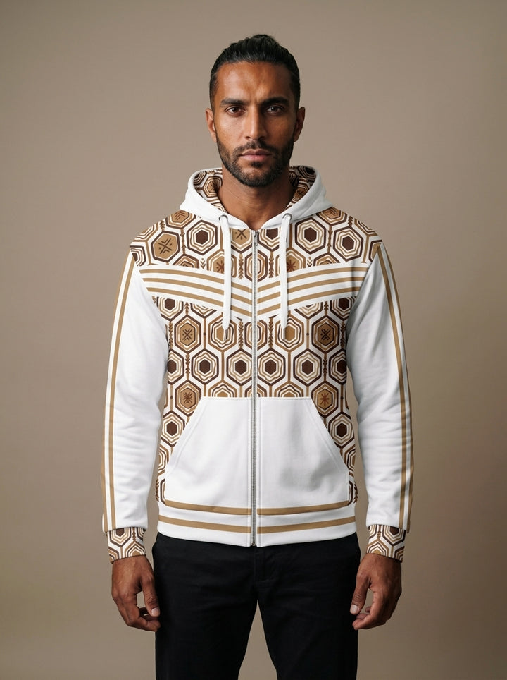 AnanseNova™ Zip Hoodie in Ocha White, front view on model — hexagon all-over print, bronze chevron stripes, full zip