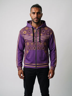 AnanseNova™ Zip Hoodie in Ugo Purple, front view on model — hexagon all-over print, bronze chevron stripes, full zip