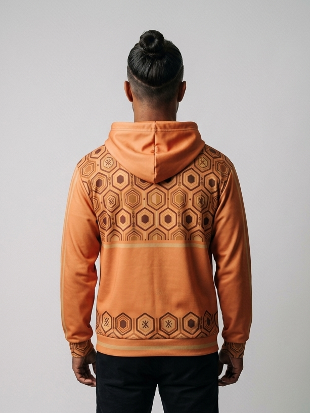 AnanseNova™ Zip Hoodie in Sango Orange, back view — hexagon yoke panel and hexagon hem band