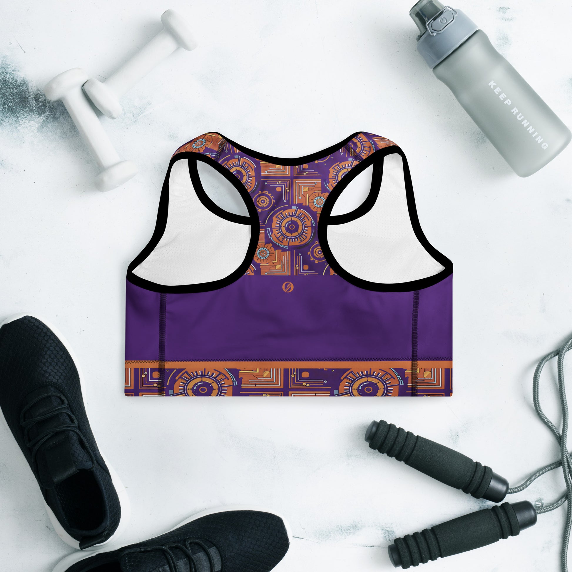Sankofa Padded Sports Bra in the purple, burnt orange and cyan Kinetic Engine print, back view.