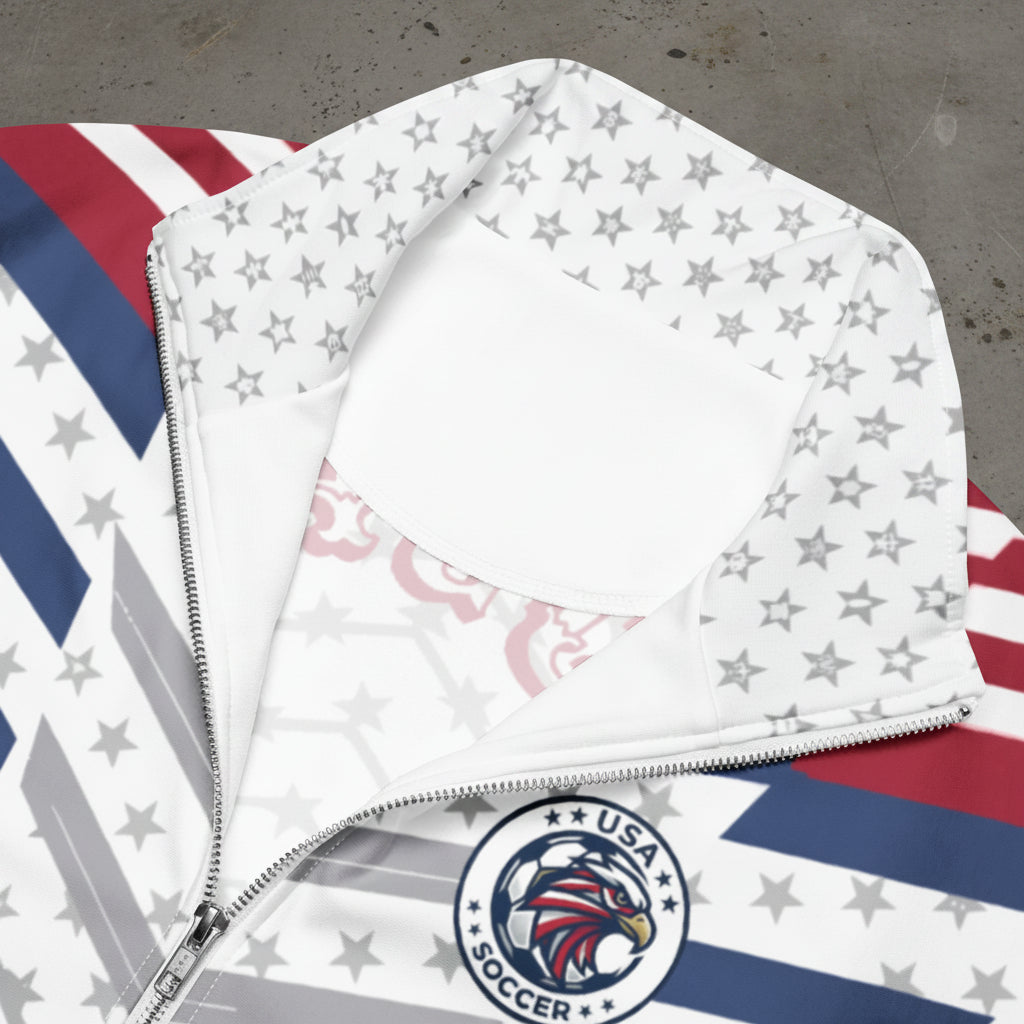 USA '26 Track Jacket fabric detail — sublimated grey star-field across the recycled polyester chassis, GRS-certified construction