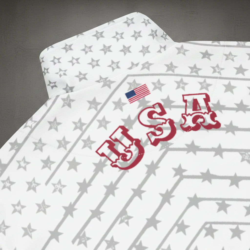 USA '26 Track Jacket construction detail — flag-banded rib trim in navy, white, and crimson, premium silver YKK zipper hardware