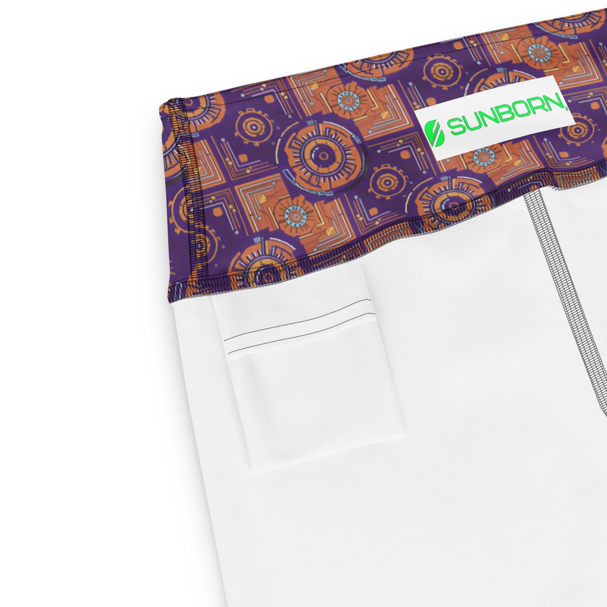 Close-up of the high waistband on the Sankofa Yoga Shorts in the Kinetic Engine print.