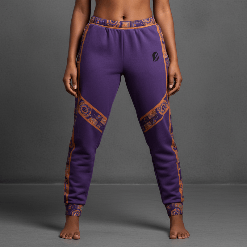 Sankofa women's joggers — Afrofuturist heritage training pants — royal purple and forge copper side seam — image 1 — SunBorn