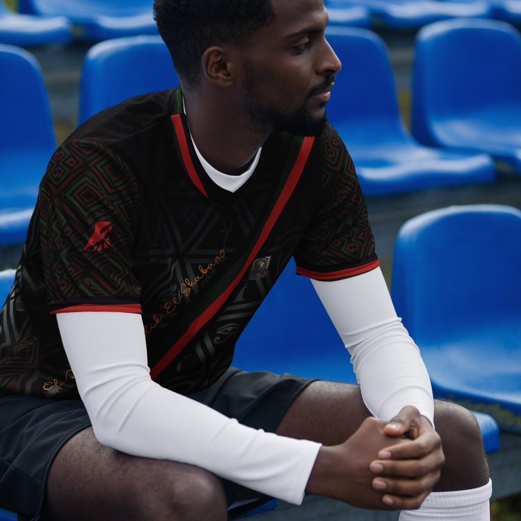 BHM '26 X Protocol jersey — Pan-African self-determination heritage with red, black, green tricolor geometry — image 9 — SunBorn